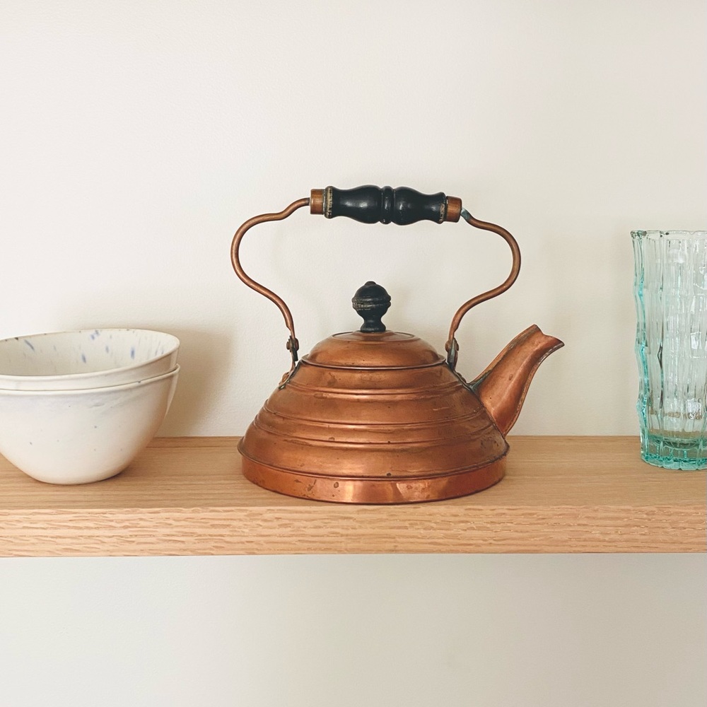 Antique copper tea kettle